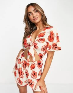 Monki Relaxed Playsuit With Tie Front And Frill Sleeves In Poppy Print For Women 11 Monki Relaxed Playsuit With Tie Front And Frill Sleeves In Poppy Print For Women -Monki Shop 203149829 1 poppyprint 1