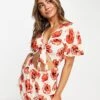 Monki Relaxed Playsuit With Tie Front And Frill Sleeves In Poppy Print For Women -Monki Shop 203149829 1 poppyprint