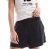 Monki Super Soft Pull On Shorts In Black For Women