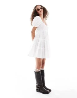 Monki Textured Babydoll Mini Dress With Tiered Hem And Puff Sleeves In White For Women -Monki Shop 206134686 1 white 1