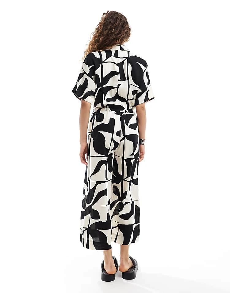 Monki Tie Waist Jumpsuit In Black And White Puzzle Print For Women 6 Monki Tie Waist Jumpsuit In Black And White Puzzle Print For Women - Image 4