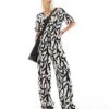Monki Short Sleeve Jumpsuit With Wrap Front In Bold Mono Abstract Print For Women Multi -Monki Shop 206407394 1 multi