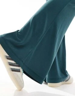 Monki Super Soft Low Waist Flare Jersey Trousers In Green For Women -Monki Shop 207022640 2