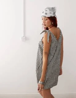 Monki Seersucker Bow Tie Strap Mini Dress With Side Pockets In Black And White Gingham For Women -Monki Shop 207067419 4