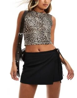 Monki Mini Pleated Skirt With Front Tie Up Detail In Black For Women