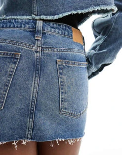 Monki Low Waist Denim Mini Skirt In Mid Blue Wash For Women -Monki Shop 207969039 3