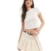 Monki Pleated Mini Skirt With White Layered Raw Hem Detail In Beige For Women -Monki Shop 208134889 1 beige