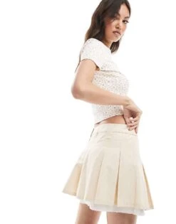 Monki Pleated Mini Skirt With White Layered Raw Hem Detail In Beige For Women -Monki Shop 208134889 3